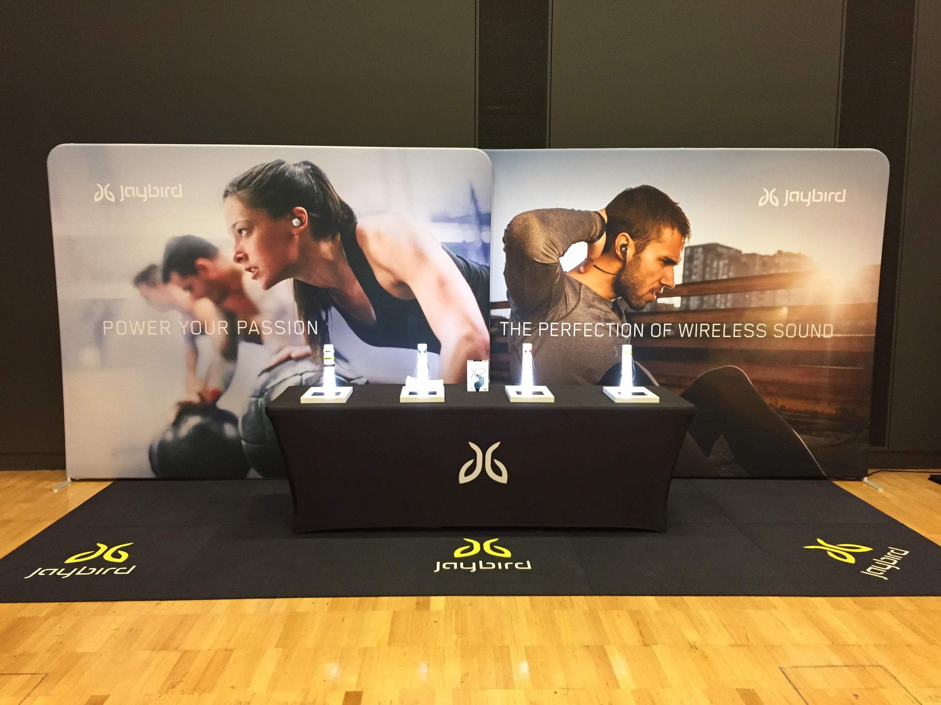 Jaybird exhibition stand with branded floor tiles